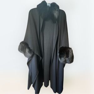 Black authentic fur coat. Semi-cape style